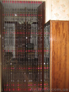 Декоративные шторы из  подвесок и колец