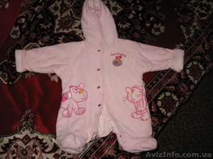 Продам демисезонный комбинезон для новорожденной