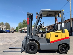 Вилковий дизельний автонавантажувач TCM (Nissan) з ротатором,  з кабiною та пічко #1749032